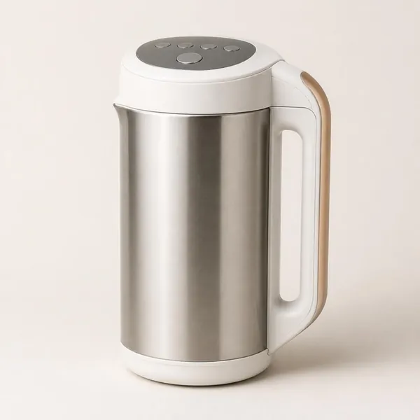 Blender chauffant au corps en inox brossé, couvercle blanc à boutons et grande poignée blanche